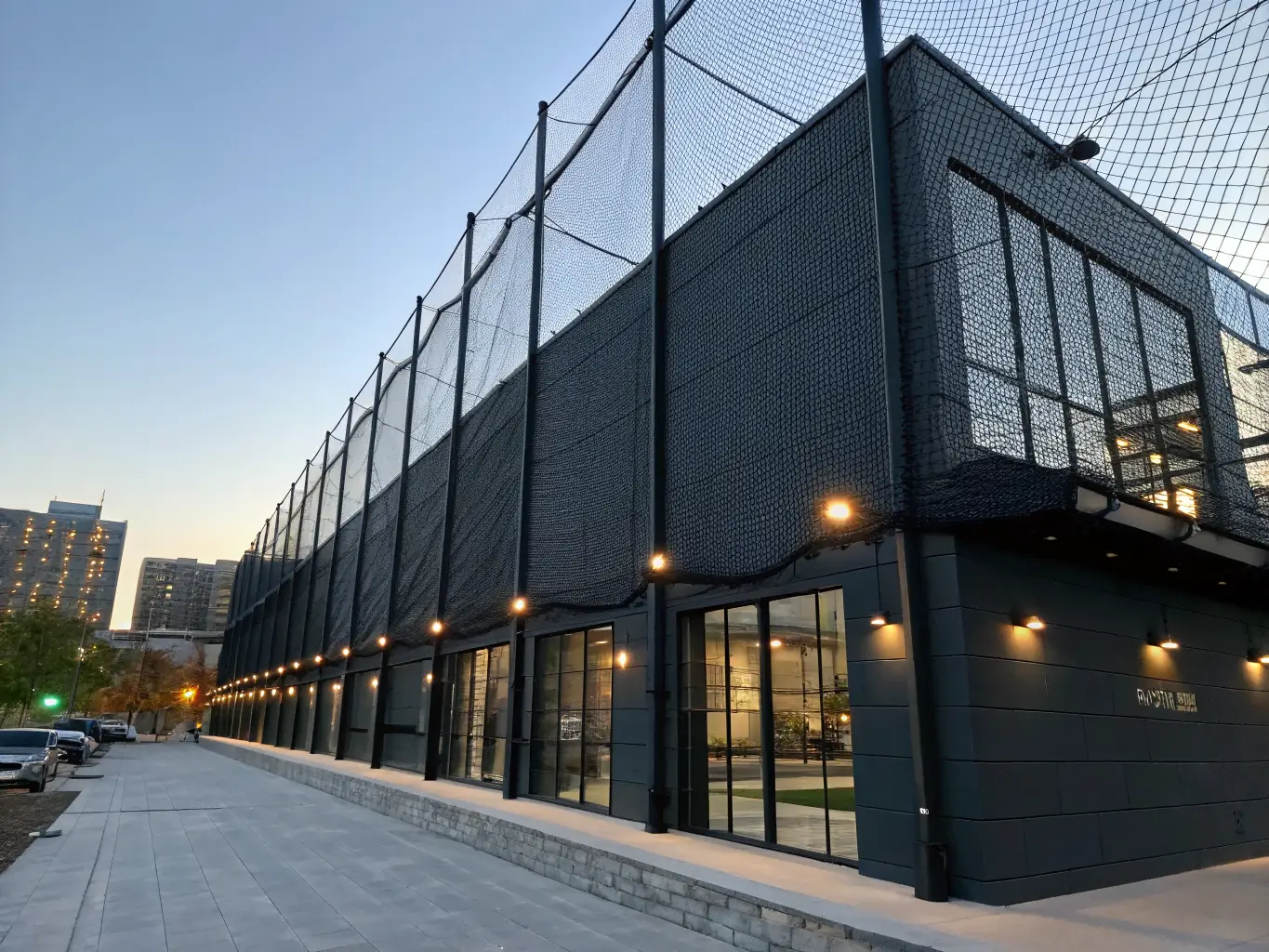 An image of bird netting installed on a building facade, preventing birds from nesting and roosting.
