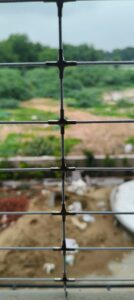 Invisible Grill Installation Service in Ahmedabad – Premium Diamond Grill by Span Shield As modern homes in Ahmedabad increasingly adopt open balconies, large windows, and high-rise living, Invisible Grill Installation has become the preferred safety solution. Combining maximum safety, modern aesthetics, and long-term durability, invisible grills—also known as Diamond Grills—offer a sleek alternative to bulky iron grills. Span Shield is a trusted name for Invisible Grill Installation in Ahmedabad, delivering superior quality materials, expert fitting, and customized solutions for residential and commercial properties. What Is an Invisible / Diamond Grill? An Invisible Grill uses high-tensile SS 304 or SS 316 stainless steel wire ropes arranged in vertical or diamond patterns. These grills are: Almost invisible from a distance Rust-resistant and weatherproof Child-safe and pet-safe Ideal for balconies, windows, staircases, and French doors The Diamond Grill pattern enhances strength while maintaining a premium architectural appearance. Invisible Grill Installation in Ahmedabad – Areas We Serve Span Shield provides Invisible Grill and Diamond Grill Installation across all major locations in Ahmedabad and Gandhinagar. Invisible Grill in Gota High-rise apartments in Gota demand strong yet elegant safety solutions. Our Diamond Grill in Gota ensures balcony safety without blocking views. Invisible Grill in Tragad For residential societies and villas, Invisible Grill Installation in Tragad offers durability, child safety, and a clean modern finish. Invisible Grill in Zundal Zundal homes benefit from SS 304 and SS 316 wire rope grills designed for long-term outdoor exposure and minimal maintenance. Invisible Grill in Jagatpur Span Shield delivers customized Invisible Grills in Jagatpur for windows, balconies, and staircases with precise fitting. Invisible Grill in Shela Looking for a premium solution? Our Diamond Grill in Shela is popular among luxury apartments for its strength and minimal look. Invisible Grill in Bopal We offer competitive Diamond Grill Installation in Bopal, ensuring safety for families while maintaining elegant architecture. Diamond Grill Price in Ahmedabad The Diamond Grill price depends on several technical factors: Wire rope grade: SS 304 or SS 316 Wire thickness: 2 mm or 2.5 mm Total area (sq. ft.) Installation height and access Diamond or vertical pattern design Indicative Diamond Grill Pricing 2 mm SS 304 wire rope – Cost-effective, ideal for standard balconies 2.5 mm SS 304 wire rope – Higher strength for high-rise buildings SS 316 wire rope – Premium marine-grade quality for coastal or harsh environments For the best diamond grill price in Ahmedabad, Span Shield offers transparent quotations with no hidden costs. Wire Rope Specifications – Quality That Matters Span Shield uses only certified, high-tensile stainless steel wire ropes: SS 304 wire rope – Excellent corrosion resistance, long life SS 316 wire rope – Superior rust protection, ideal for premium projects 2 mm wire rope – Suitable for windows and low-risk balconies 2.5 mm wire rope – Heavy-duty safety for high-rise buildings All fittings, anchors, and frames are made from premium-grade materials to ensure maximum load-bearing capacity. Why Choose Span Shield for Invisible Grill Installation? Span Shield is recognized as one of the best Invisible Grill and Diamond Grill installation companies in Ahmedabad because we offer: Expert site inspection and customized design Best fitting with precise tension alignment Premium SS 304 & SS 316 quality materials Clean, damage-free installation Competitive pricing with long-term durability Excellent after-sales support Our installations meet modern safety standards while enhancing the overall look of your property. Applications of Invisible & Diamond Grills Balcony safety grills Window invisible grills Staircase protection French doors and large openings High-rise apartment safety Villas and premium homes Best Invisible Grill Company in Ahmedabad – Span Shield If you are searching for: Invisible Grill in Ahmedabad Diamond Grill in Gota, Bopal, Shela Invisible Grill Installation in Tragad, Zundal, Jagatpur Best Diamond Grill price with SS 304 / SS 316 wire rope Span Shield is your trusted solution partner. Get a Free Site Visit & Quote Today Contact Span Shield for professional Invisible Grill & Diamond Grill Installation Services in Ahmedabad with guaranteed quality, safety, and aesthetics.